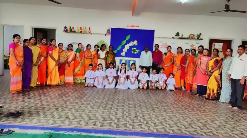 Adults stand in a row while children in white uniforms kneel in front, beneath a SMARTKiDZ sign.